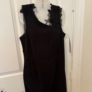 Neiman Marcus size 8 black polyester cocktail dress with appliqués.